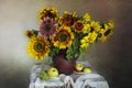 A spectacular bouquet of sunflowers in a vase on a brown background. Royalty Free Stock Photo