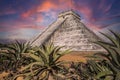Spectacular Chichen Itza Pyramid in the province of Cancun, Mexico against a colorful sunset Royalty Free Stock Photo