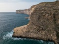 Xlendi cliffs aerial on Gozo island Malta Royalty Free Stock Photo