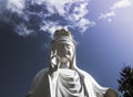 Spectacular cloud over the statue of GuanYin, the Goddess of Mercy and Compassion in the buddhist religion Royalty Free Stock Photo