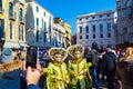 Spectacular disguised people Venice Masquerade San Marco square Italy