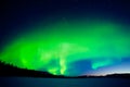 Intense display of Northern Lights at morning dawn