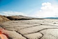 Spectacular dried cracked earth surface at Muddy Volcanoes