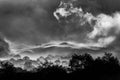 Spectacular early morning misty British rural landscape with rolling hills and trees