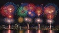 A spectacular firework display brightens the night sky over a cityscape Royalty Free Stock Photo