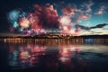 A spectacular fireworks display by the seaside reflecting in the water