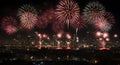 Spectacular fireworks light up the city skyline at night Royalty Free Stock Photo