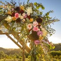 Spectacular flowers on a wooden Huppah sunset