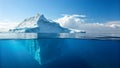 Spectacular Iceberg: A Glimpse Above and Below the Ocean\'s Surface, Featuring Crystal Blue Water and Dramatic Cloud Formations Royalty Free Stock Photo