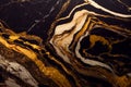 Spectacular image of black and gold liquid ink churning together, with a realistic look Royalty Free Stock Photo