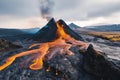 Spectacular landscape of an erupting volcano in Iceland surrounded by other hills showing the large expanse of land around the Royalty Free Stock Photo