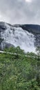 The spectacular Langfoss waterfall in Norway. Royalty Free Stock Photo