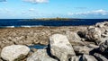 Spectacular limestone landscape discovered and the ocean in Doolin bay Royalty Free Stock Photo