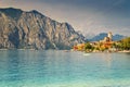 Spectacular Malcesine tourist resort and high mountains, Garda lake, Italy Royalty Free Stock Photo