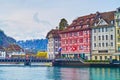 Spectacular medieval houses on bank of Reuss river, on March 30 in Lucerne, Switzerland