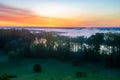 Spectacular mist river over the river valley during the sunrise