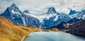 Spectacular morning view of Bachalp lake / Bachalpsee, Switzerland. Wonderful autumn scene of Swiss alps, Grindelwald, Bernese Obe Royalty Free Stock Photo