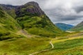 Spectacular mountain scenery with a stormy, grey sky in Glencoe, Scotland