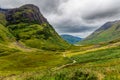 Spectacular mountain scenery with a stormy, grey sky in Glencoe, Scotland