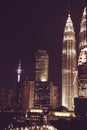 Spectacular night city view. Kuala Lumpur famous skyscrapers, Malaysia. Business metropolis. Modern office buildings. Luxurious tr