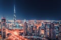 Spectacular nighttime Dubai skyline with illuminated skyscrapers. Royalty Free Stock Photo