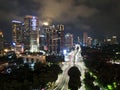 Spectacular nighttime skyline of a big modern city at night. Semanggi, Jakarta, Indonesia. Aerial view on highways and skyscrapers