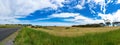 Spectacular panorama of countryside road and field