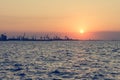 Spectacular panorama view of sun setting into Thermaic gulf. Royalty Free Stock Photo