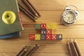 Spectacular representation of back to school with wooden cubes on a wooden table, books, green apple, old metal alarm clock and ru Royalty Free Stock Photo