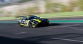 Spectacular scenic racing car on asphalt racetrack Mercedes AMG blurred motion background