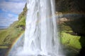 A Rainbow Behind the Seljalandsfoss Waterfall - Part of Iceland\'s South Coast Waterfalls Royalty Free Stock Photo