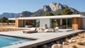 Spectacular and serene modern white house with a stunning pool nestled amidst breathtaking mountains
