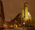 Spectacular shot of the magnificent Minoriten Church in Vienna on a winter night Royalty Free Stock Photo