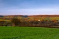 A spectacular show of colors during the sunrise in the rolling hills of the Netherlands over the village of Epen, in the Heuvellan Royalty Free Stock Photo