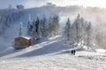 Spectacular ski slopes in the Carpathians,Poiana Brasov ski resort,Transylvania,Romania,Europe,Pine forest covered in snow on Royalty Free Stock Photo