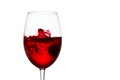 Spectacular small splash of red wine in a glass Royalty Free Stock Photo