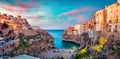 Spectacular spring cityscape of Polignano a Mare town, Puglia region, Italy, Europe. Colorful evening seascape of Adriatic sea.