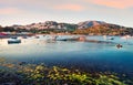 Spectacular spring scene of the Nuevo Loca Beach, Aegean sea. Wonderful evening view of the Anavyssos town, Greece, Europe. Royalty Free Stock Photo