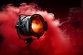 Spectacular stage illumination vibrant red spot light cutting through atmospheric fog