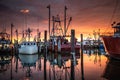 Spectacular sunrise over a fishing fleet