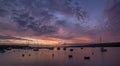 Spectacular sunrise over New Quay harbor, on the Welsh coastline Royalty Free Stock Photo