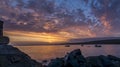 Spectacular sunrise over New Quay harbor, on the Welsh coastline Royalty Free Stock Photo