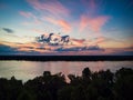 Spectacular sunset above Mississippi river near Natchez with clouds and reflections in water Royalty Free Stock Photo