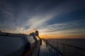 Spectacular sunset over the sea seen from the upper deck of a cruise ship Royalty Free Stock Photo