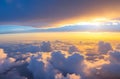 Spectacular Sunset Skies: Captivating Aerial Views of Dramatic Clouds from an Airplane.