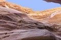 Spectacular surfaces of the stone mountains in the Red Slot Canyon. Travel Royalty Free Stock Photo