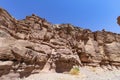 Spectacular surfaces of the stone mountains in the Red Slot Canyon. Travel Royalty Free Stock Photo