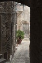 Spectacular traditional italian medieval alley in the historic center of beautiful little town of Spello Royalty Free Stock Photo