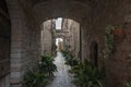 Spectacular traditional italian medieval alley in the historic center of beautiful little town of Spello Royalty Free Stock Photo