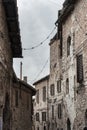 Spectacular traditional italian medieval alley in the historic center of beautiful little town of Spello Royalty Free Stock Photo